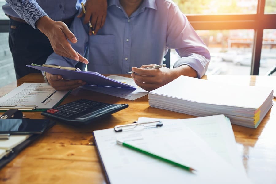 a busineman and accountant discussing about financial