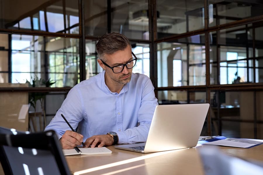 handsome businessman working in his desk