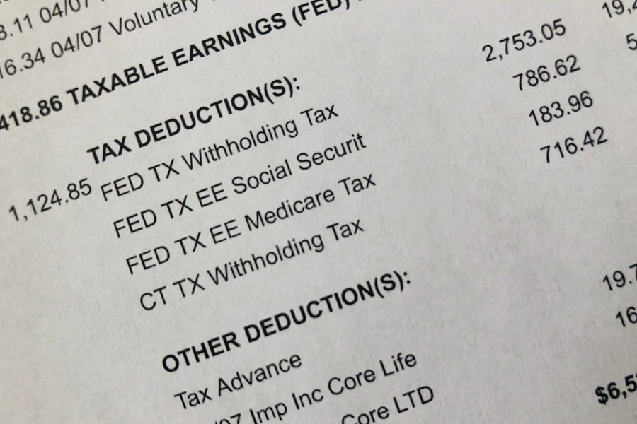 pay stub deduction in print