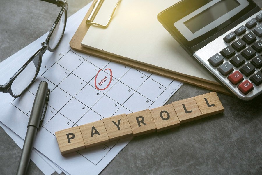 payroll written calculator and calendar