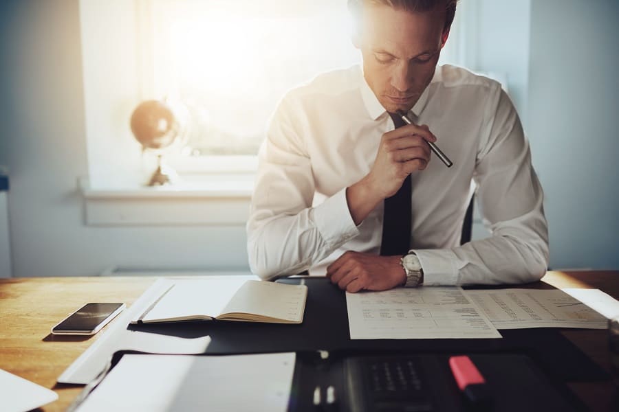 serious businessman working on his desk