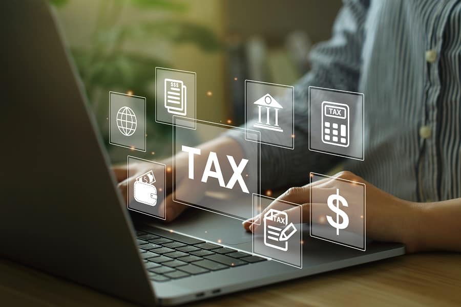 laptop and tax in words in digital