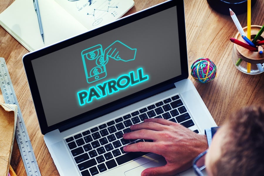 payroll in words and laptop