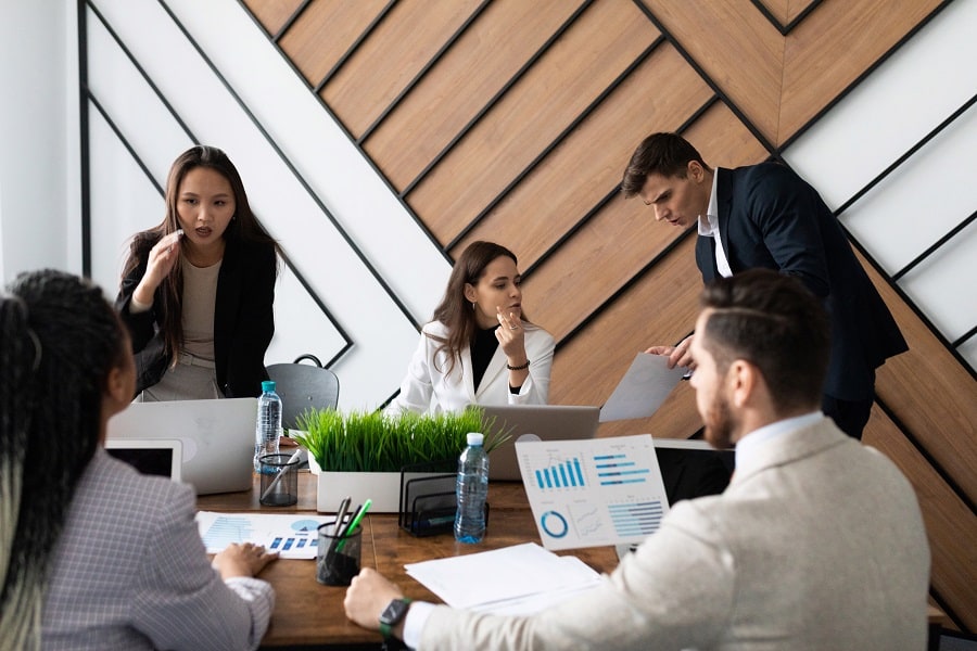 people working together discussing in the office